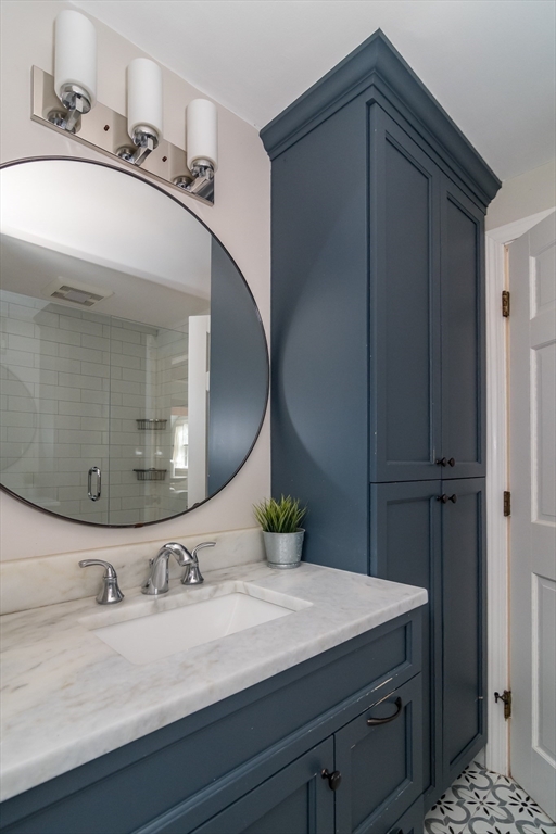8 Meeting House Hill Road Dover, MA 02030 - Photo 11 of 22 a bathroom with a sink and a mirror
