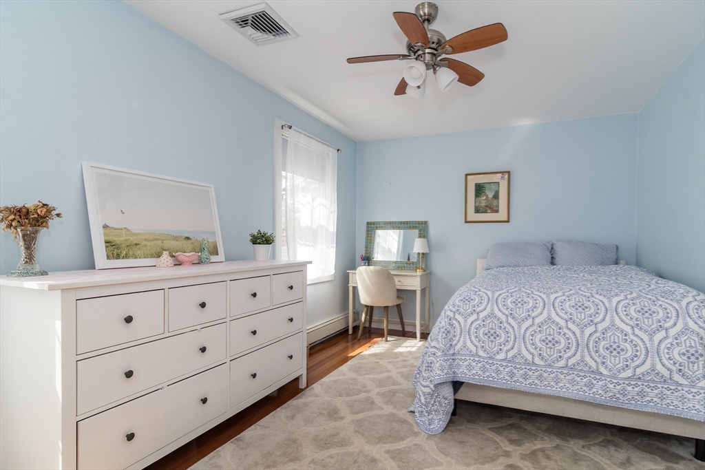 8 Meeting House Hill Road Dover, MA 02030 - Photo 14 of 22 a bedroom with a bed and a dresser