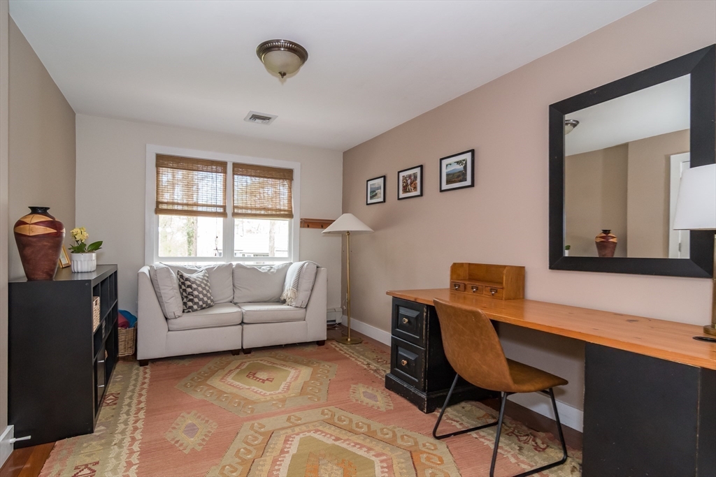 8 Meeting House Hill Road Dover, MA 02030 - Photo 17 of 22 a living room with furniture and a window