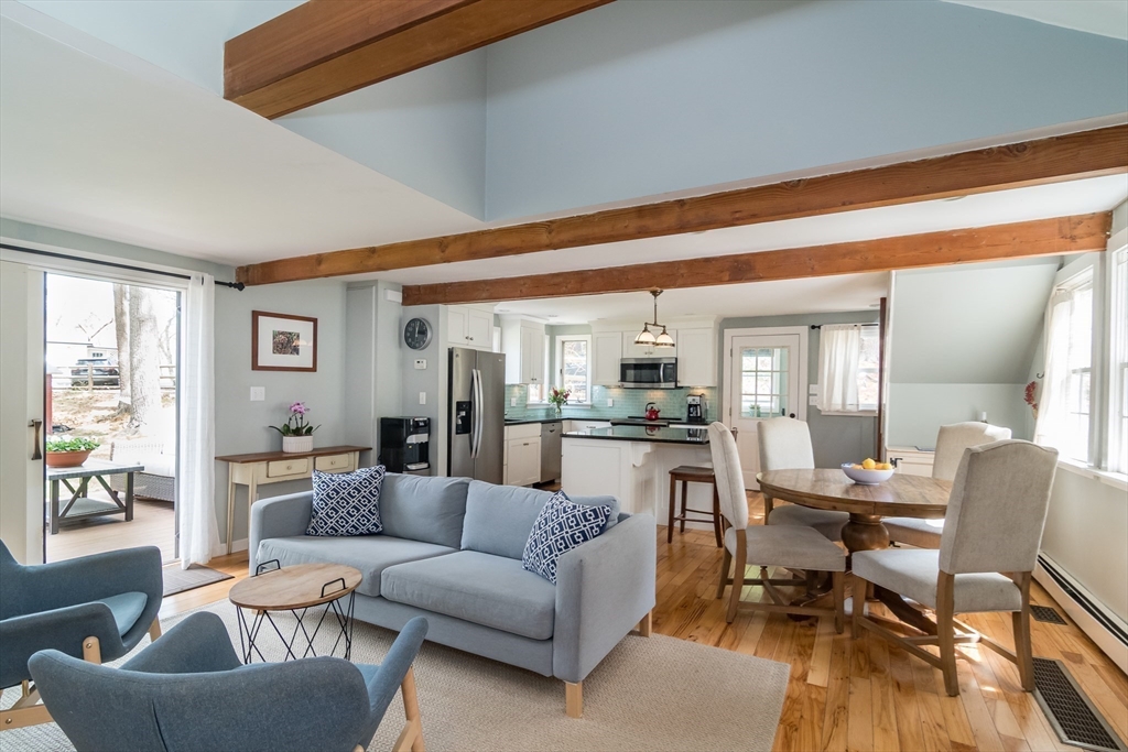 8 Meeting House Hill Road Dover, MA 02030 - Photo 3 of 22 a living room with furniture and wooden floor