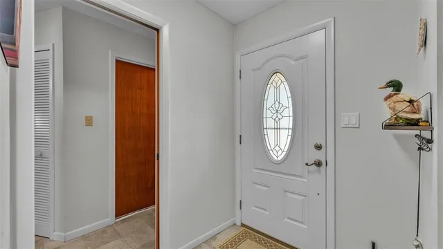 a view of a hallway with windows
