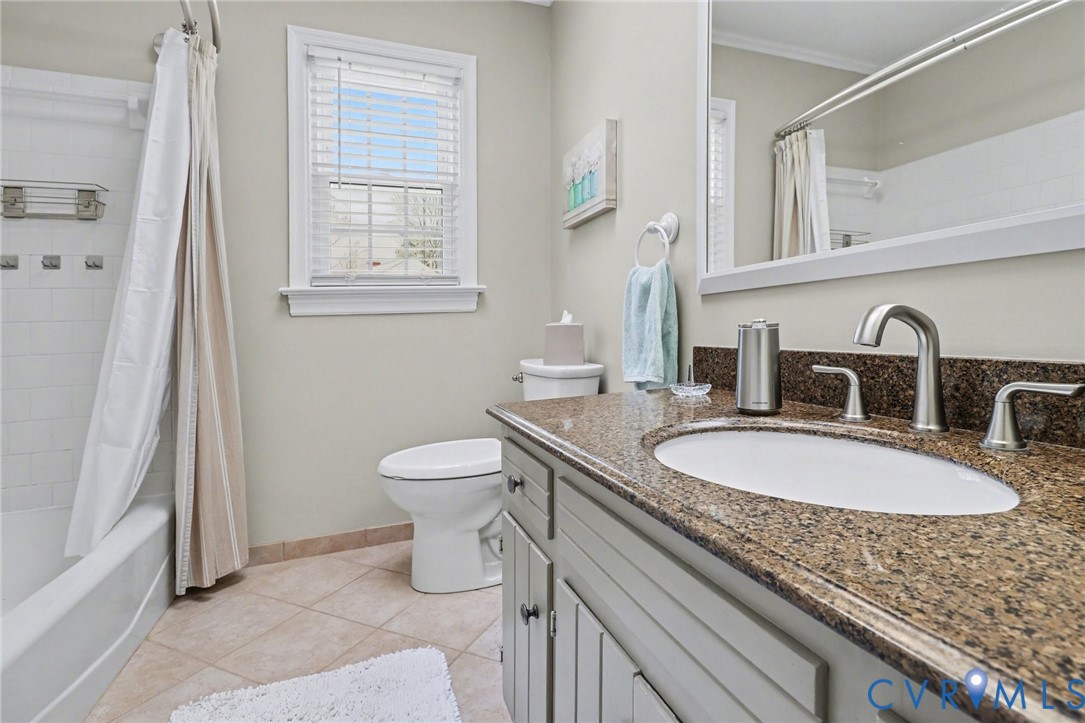 548 Glenmeadow Road Midlothian, VA 23114 - Photo 19 of 31 a bathroom with a granite countertop sink a toilet and a mirror