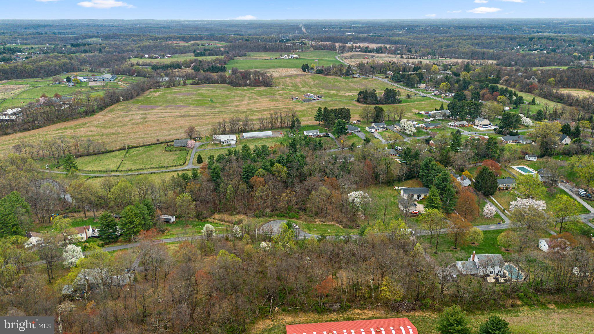 26132 Viewland Drive Damascus, MD 20872 - Photo 13 of 15 an aerial view of residential houses with outdoor space and trees