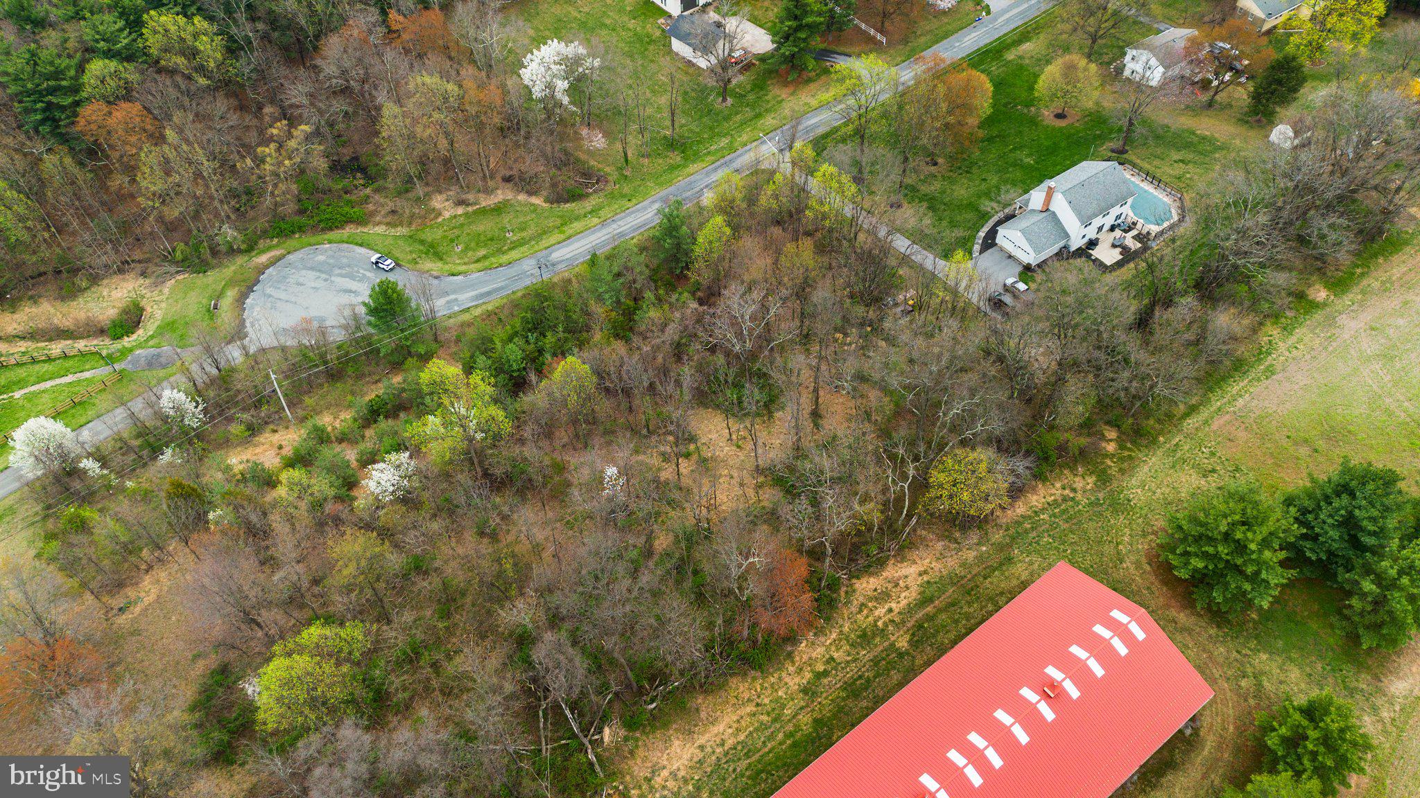 26132 Viewland Drive Damascus, MD 20872 - Photo 6 of 15 an aerial view of a house