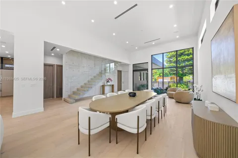 a view of kitchen with furniture and window