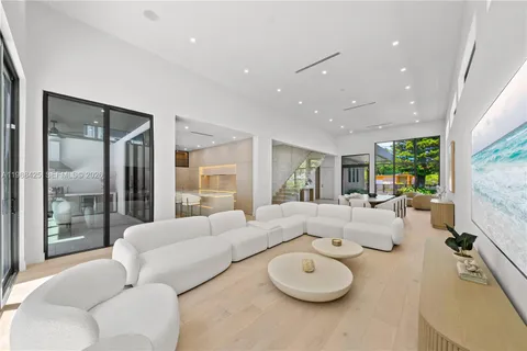 a bedroom with a bed and a painting