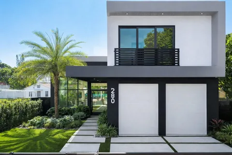 a view of a house with a small garden