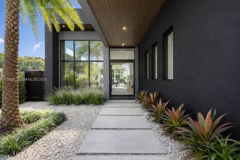 a front view of a house having yard