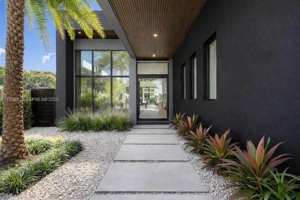 a front view of a house having yard