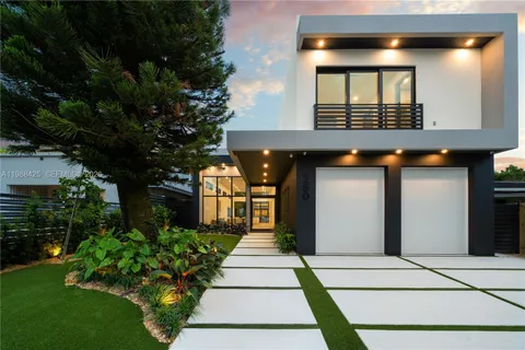 a house with garden in front of it