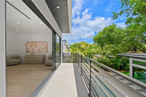 a view of a patio with a table chairs and a table