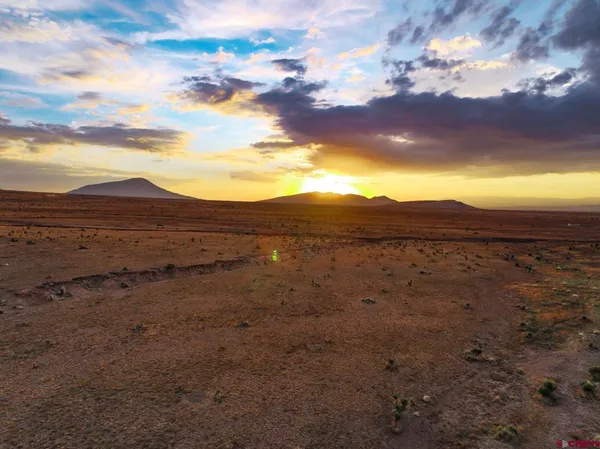 a view of a lake with a mountain in the background