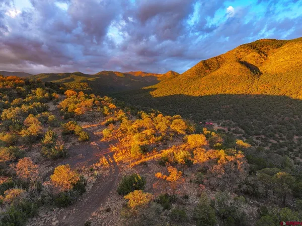 a view of ocean with mountains