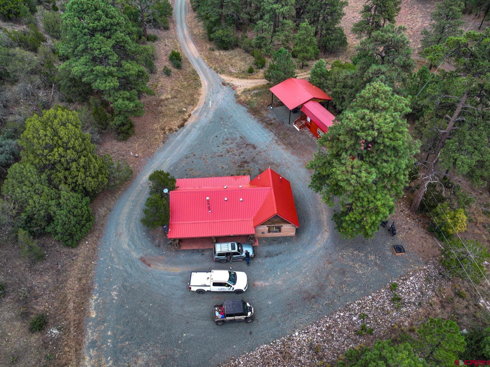 0 Us 380 Carrizozo, NM 88301 - Photo 10 of 34 an aerial view of a house with swimming pool and a yard