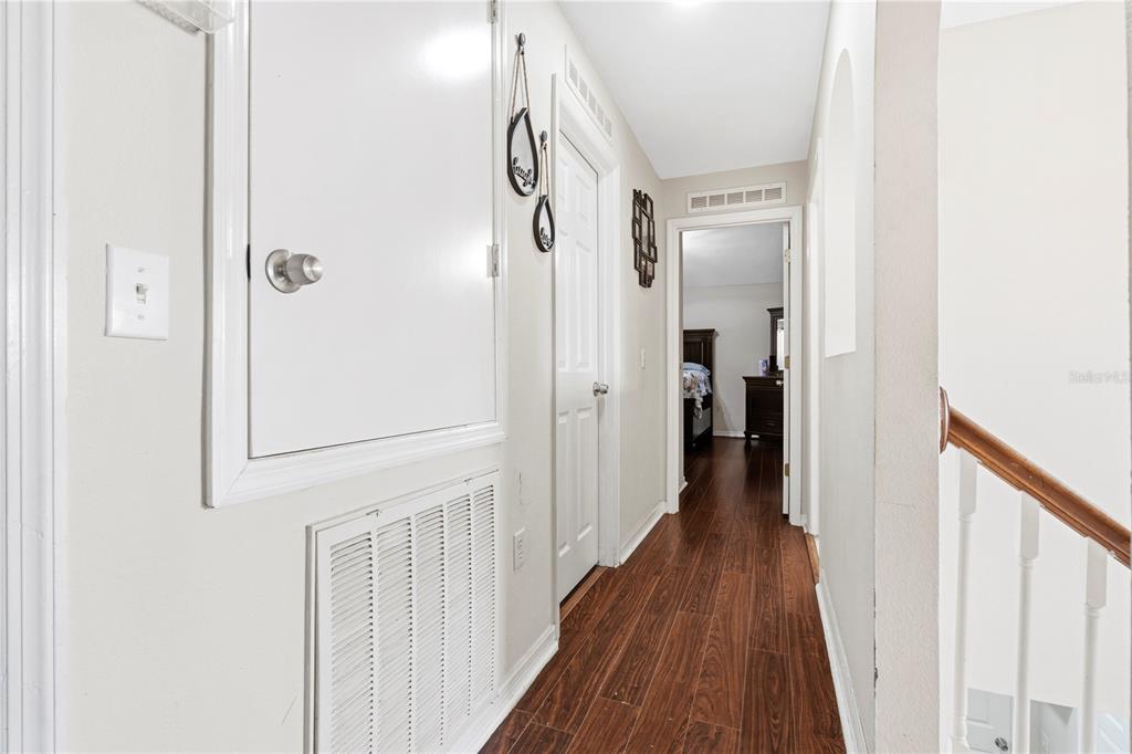 2881 Southwest 142nd Lane Ocala, FL 34473 - Photo 20 of 60 a view of a hallway with wooden floor