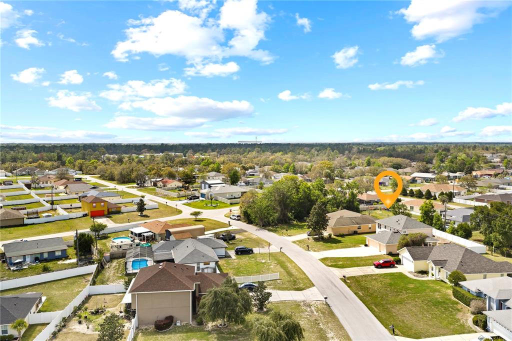 2881 Southwest 142nd Lane Ocala, FL 34473 - Photo 29 of 60 an aerial view of residential houses with outdoor space
