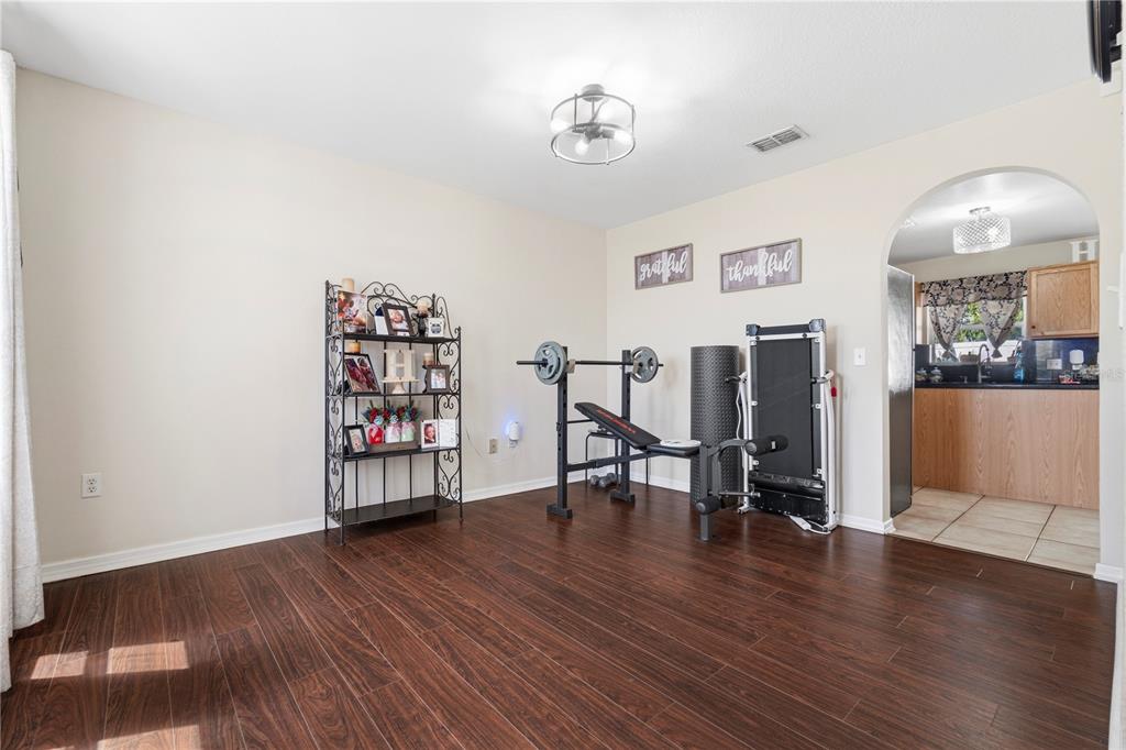 2881 Southwest 142nd Lane Ocala, FL 34473 - Photo 34 of 60 a view of a livingroom with furniture and wooden floor