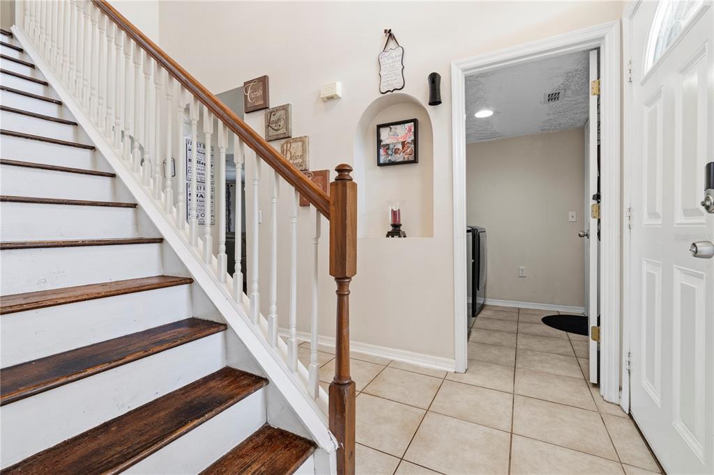 2881 Southwest 142nd Lane Ocala, FL 34473 - Photo 35 of 60 a view of a hallway with wooden floor and entryway