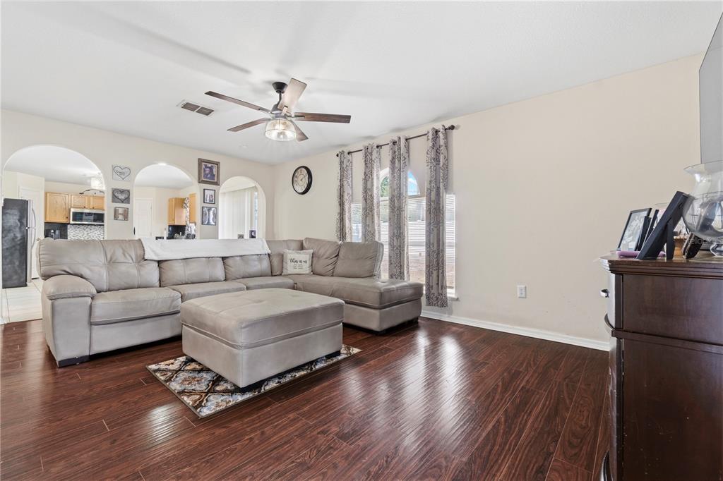 2881 Southwest 142nd Lane Ocala, FL 34473 - Photo 37 of 60 a living room with furniture and wooden floor