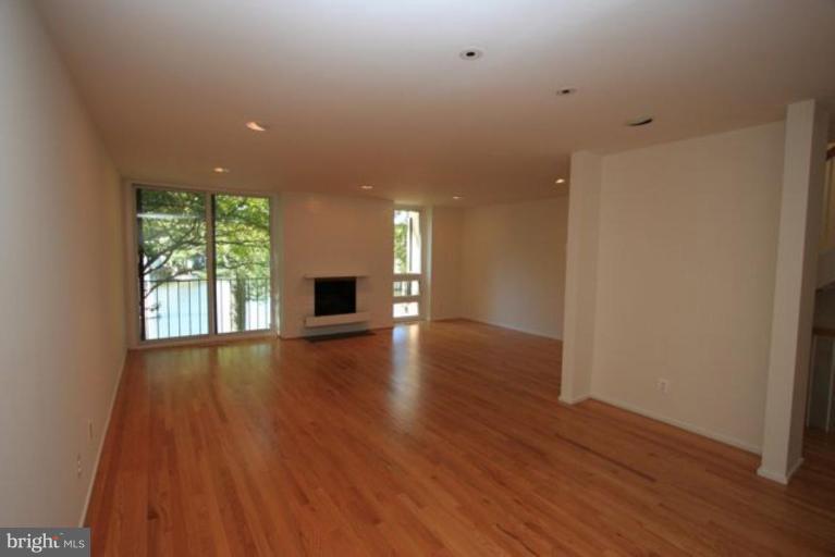 1698 Chimney House Road Reston, VA 20190 - Photo 18 of 25 Living Room/Dining Room