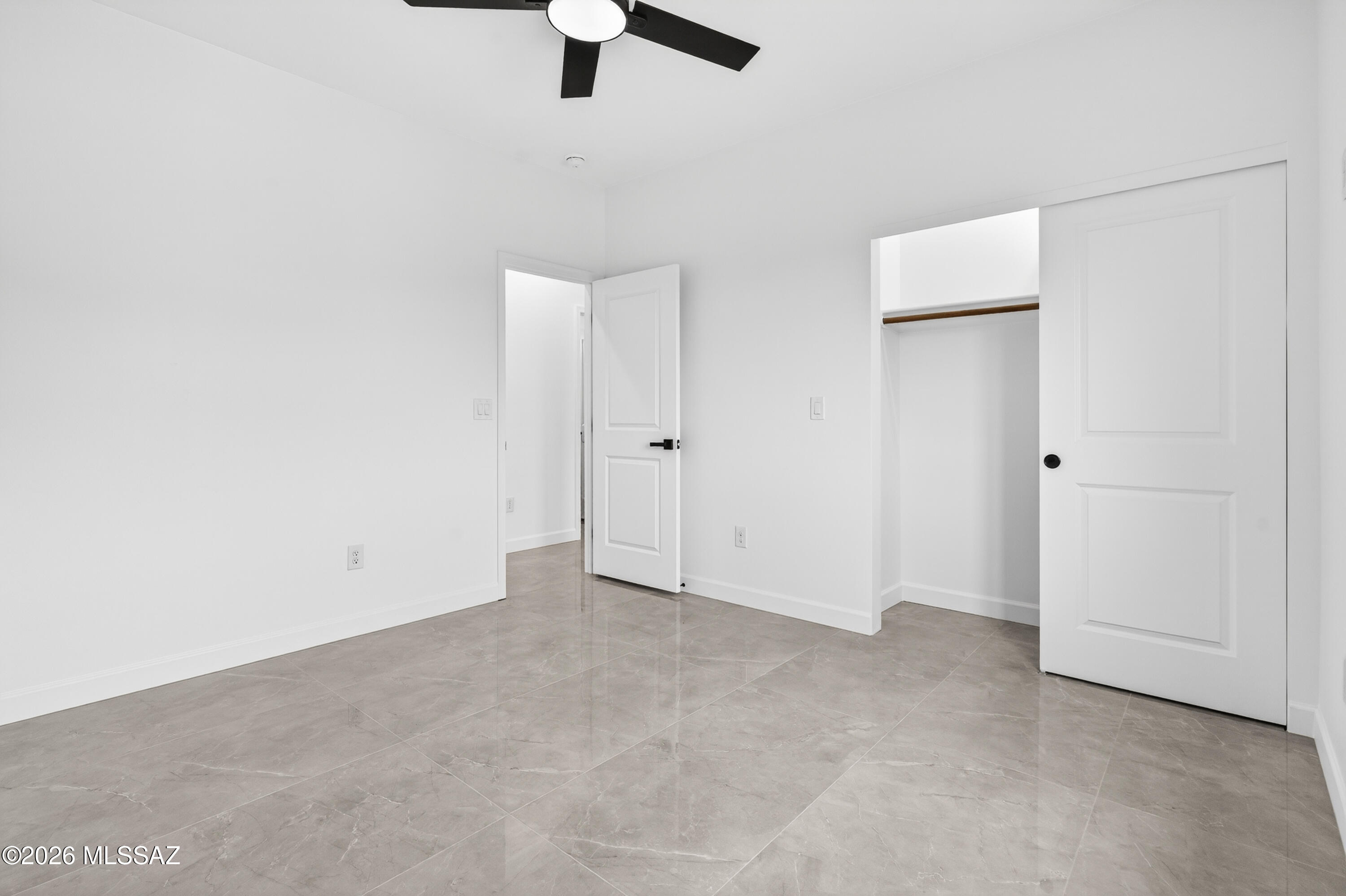 1834 Circulo Glorieta Rio Rico, AZ 85648 - Photo 28 of 35 an empty room with closet and fan
