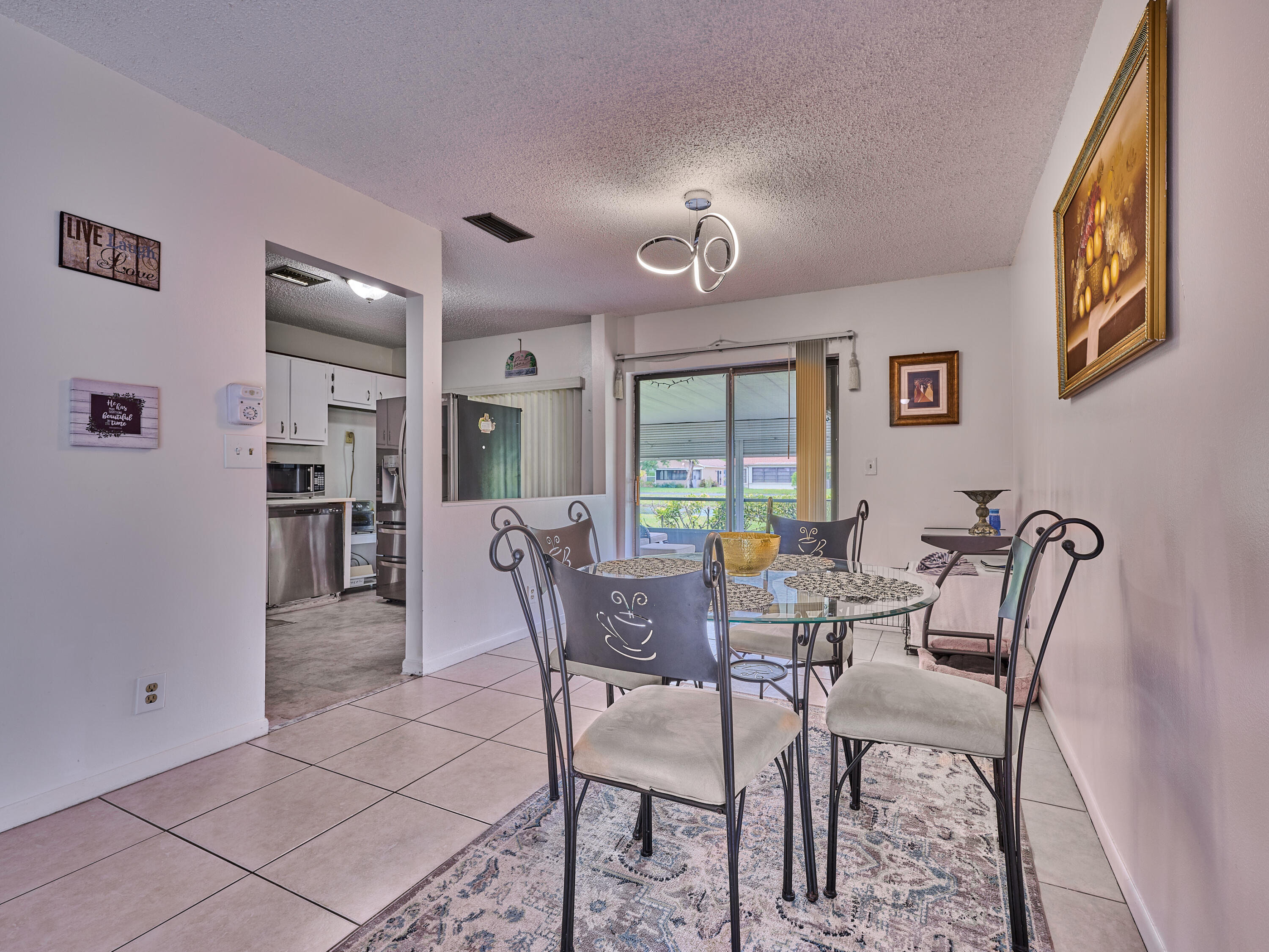 5197 Minto Road Boynton Beach, FL 33472 - Photo 9 of 32 a dining room with furniture and window