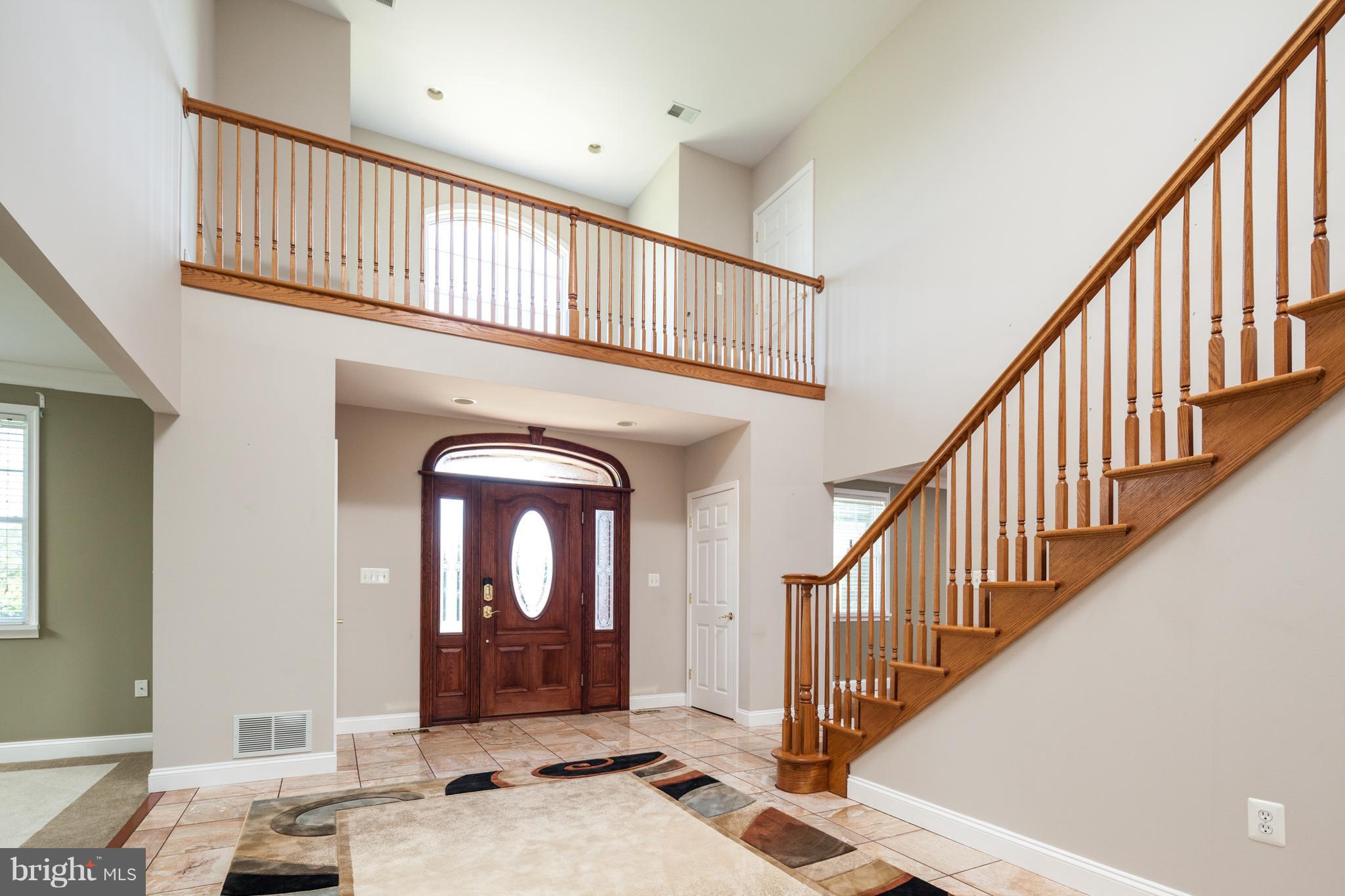 2 Story Foyer with Balcony from Master Bedroom