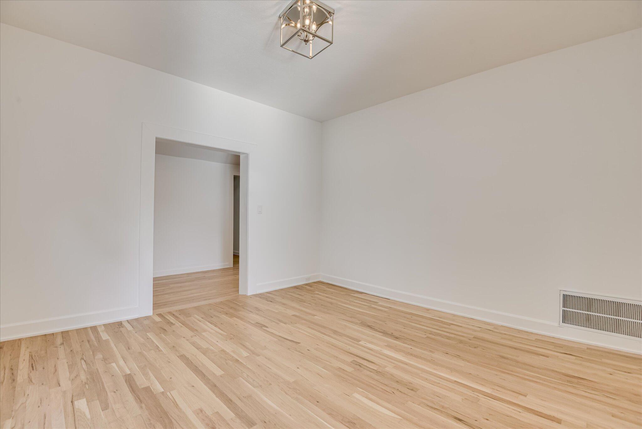 126 Mosley Road Aiken, SC 29801 - Photo 9 of 29 a view of empty room with wooden floor