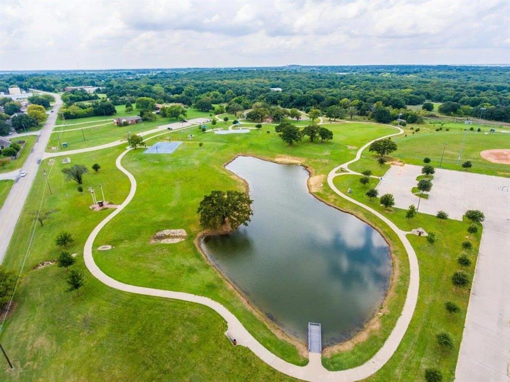 27 Old Crow Road Joshua, TX 76058 - Photo 33 of 35 an aerial view of a swimming pool a playground and lake view