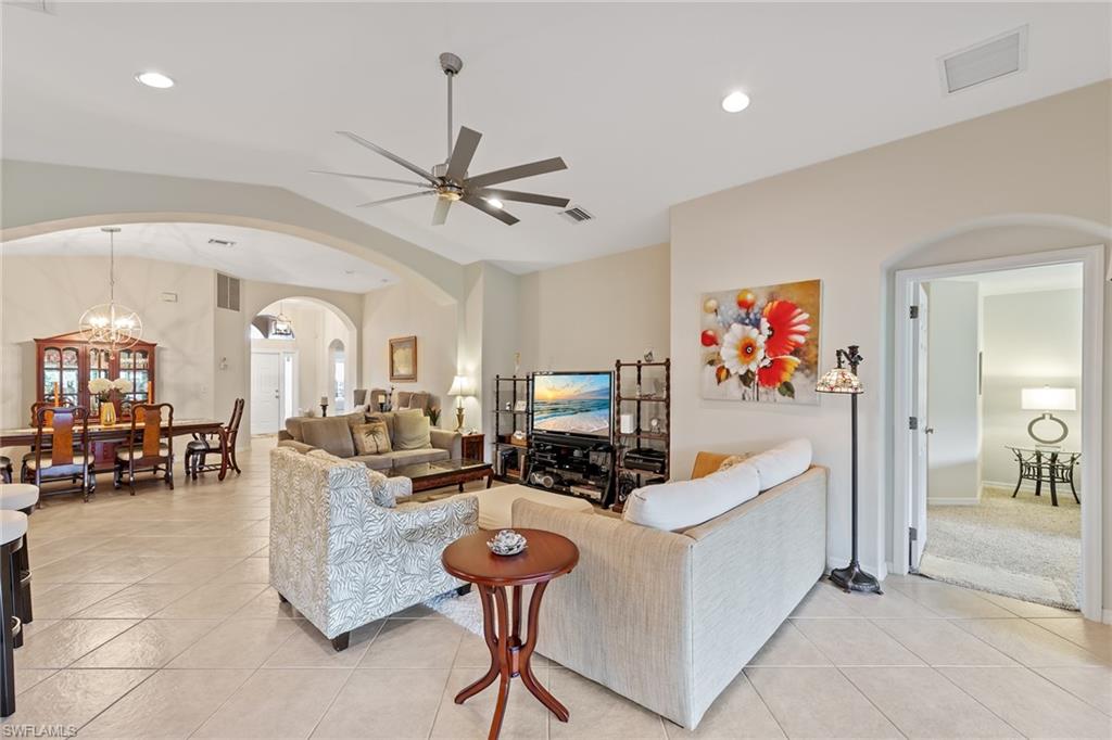 19740 Villa Rosa Loop Estero, FL 33967 - Photo 14 of 42 a living room with furniture and a flat screen tv