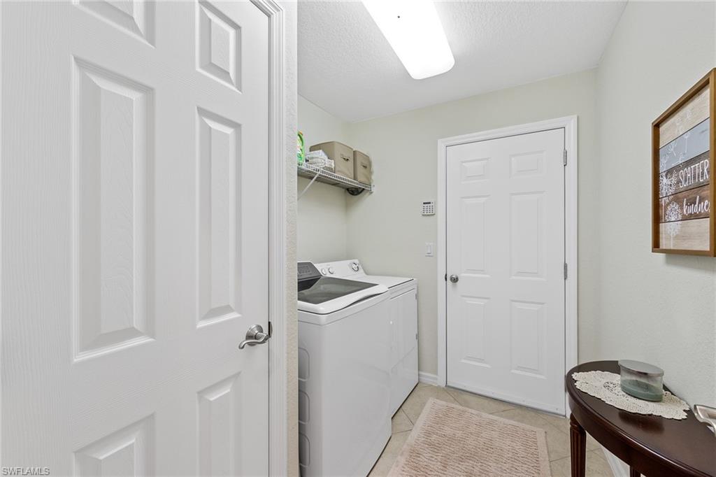 19740 Villa Rosa Loop Estero, FL 33967 - Photo 21 of 42 a view of a storage and utility room with a window