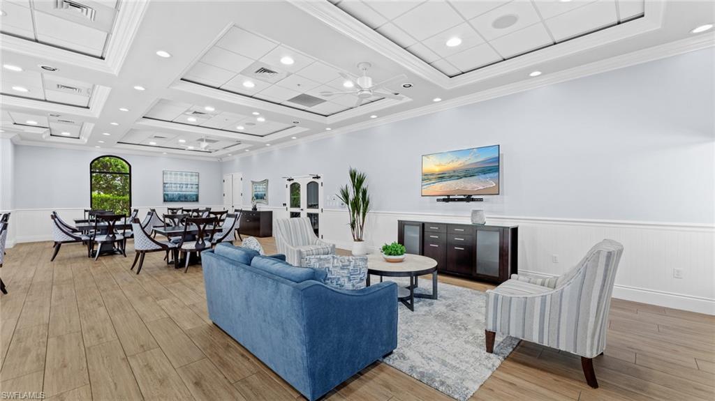 19740 Villa Rosa Loop Estero, FL 33967 - Photo 37 of 42 a living room with lots of furniture and wooden floor