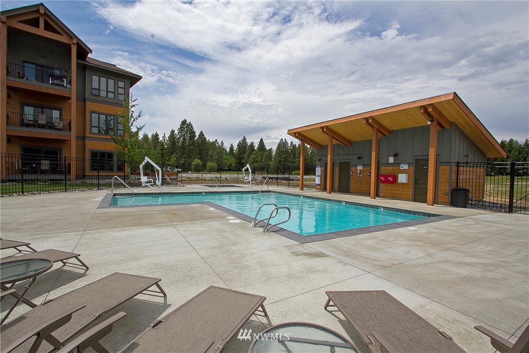 3770 Suncadia Trail, Unit 110 Cle Elum, WA 98922 - Photo 20 of 21 an outdoor space with swimming pool and furniture