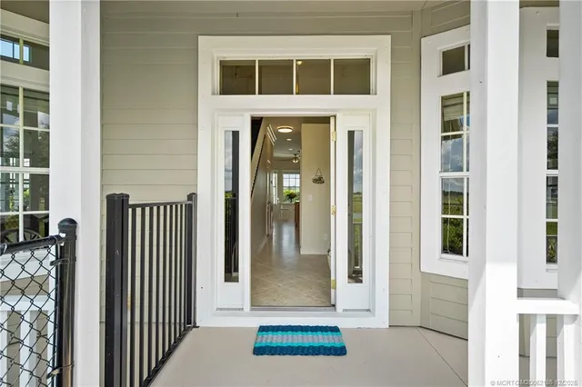 a bathroom with a double vanity sink mirror double and bathtub