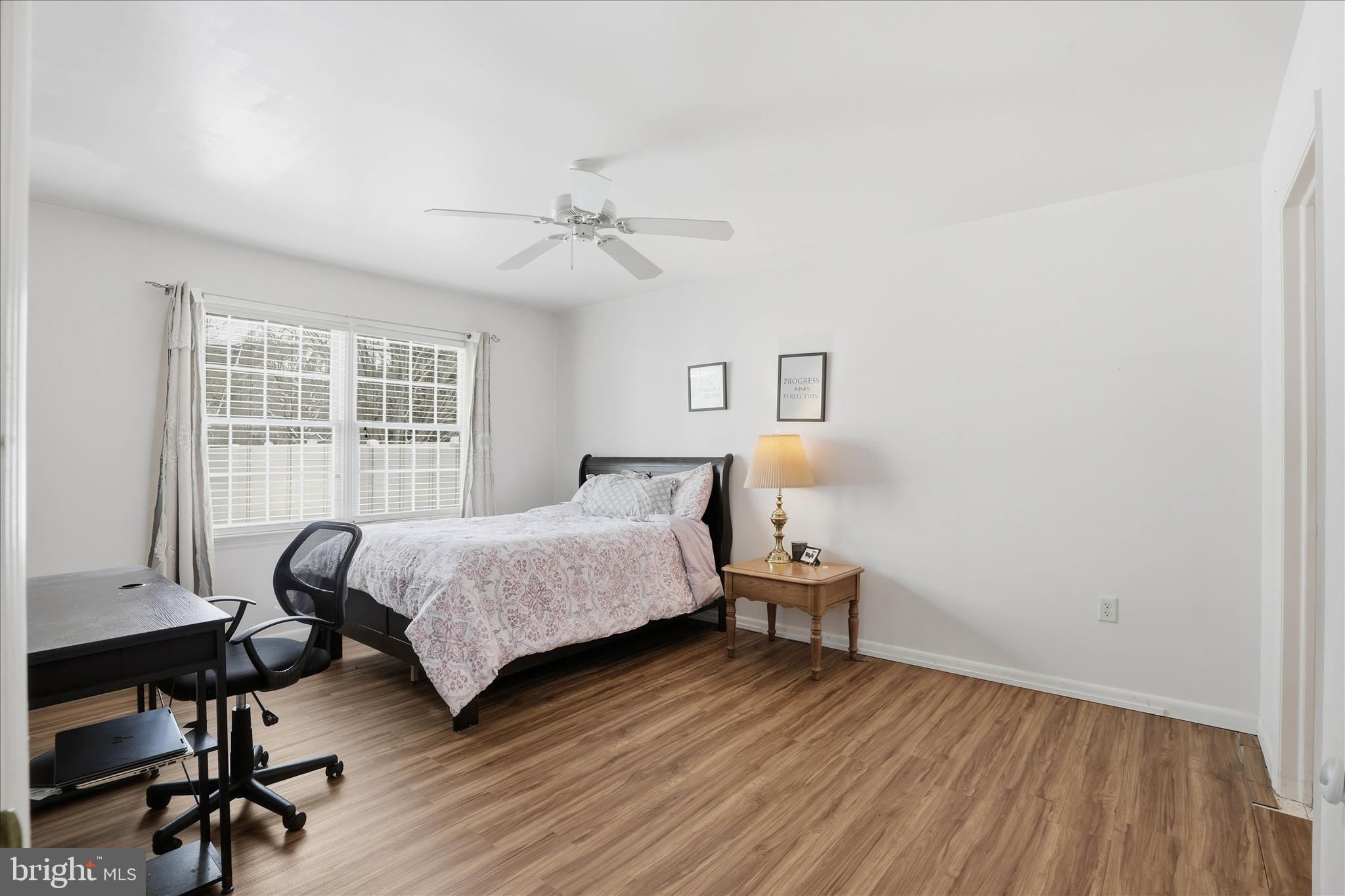 6 Spring Hill Lane Mountville, PA 17554 - Photo 17 of 39 a bedroom with a bed and a desk