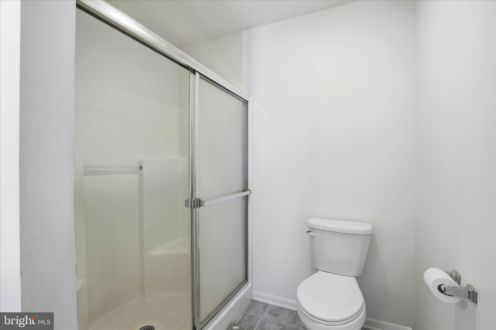 6 Spring Hill Lane Mountville, PA 17554 - Photo 22 of 39 a white toilet sitting next to a shower