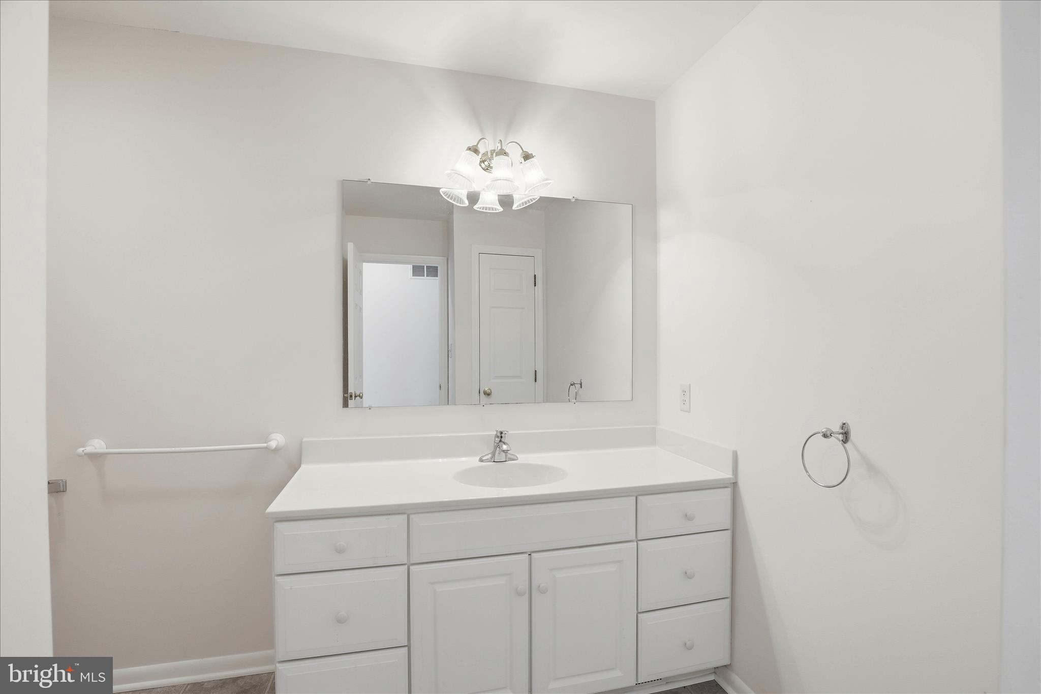 6 Spring Hill Lane Mountville, PA 17554 - Photo 28 of 39 a bathroom with a sink vanity and a mirror