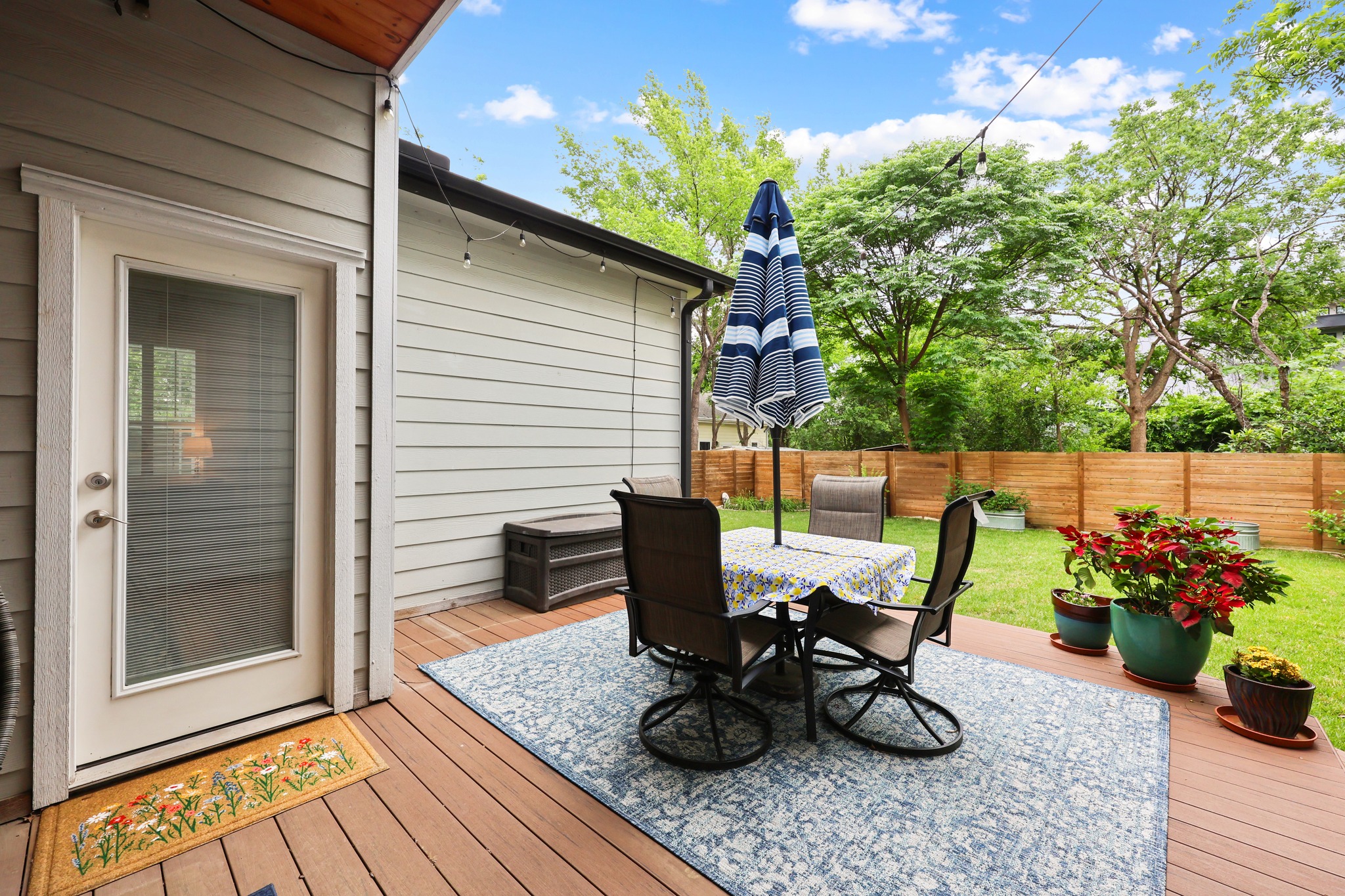 3907 Becker Avenue Austin, TX 78751 - Photo 29 of 33 Large composite deck for dining or lounging while enjoying the back yard.