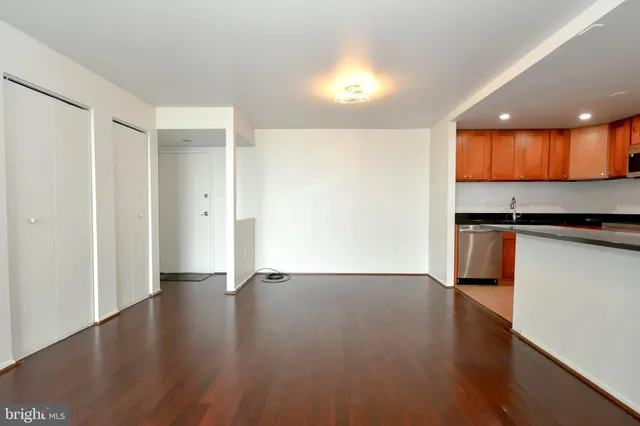 a view of a kitchen with a sink and a stove