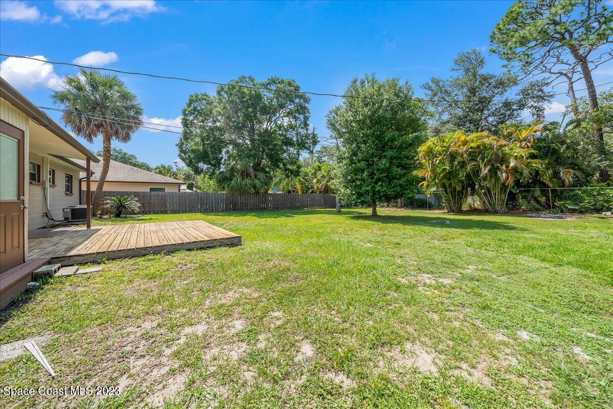 1040 Bernice Road Rockledge, FL 32955 - Photo 23 of 24 a view of a house with a yard