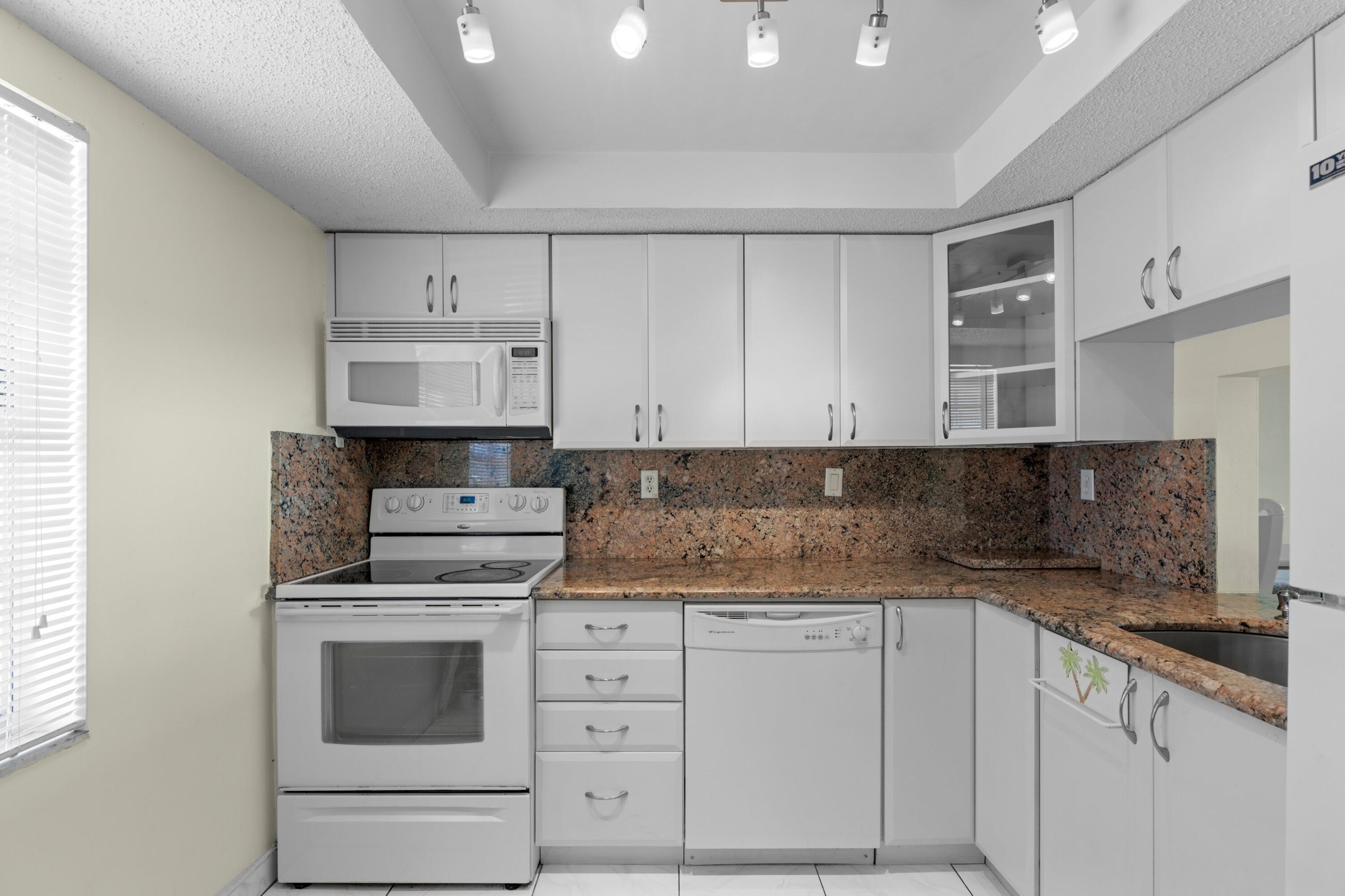 9374 Southwest 3rd Street, Unit 708 Boca Raton, FL 33428 - Photo 12 of 35 Kitchen