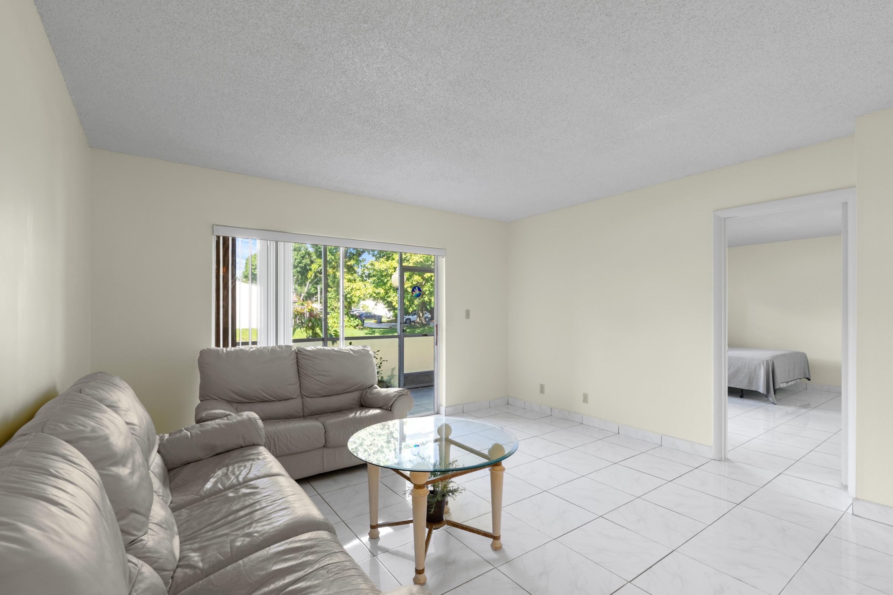 9374 Southwest 3rd Street, Unit 708 Boca Raton, FL 33428 - Photo 6 of 35 Living Room