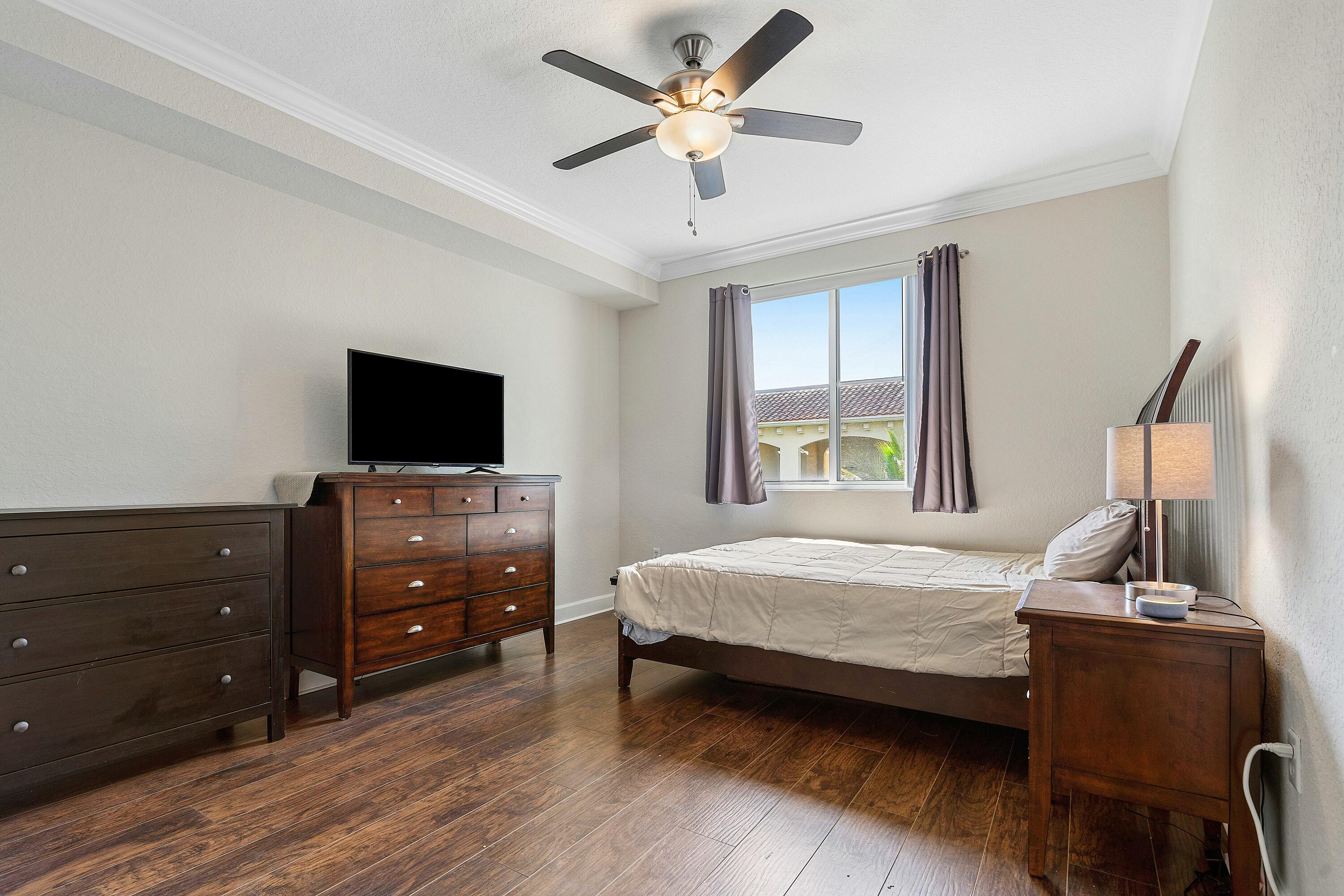 4 Renaissance Way, Unit 414 Boynton Beach, FL 33426 - Photo 14 of 19 Guest Bedroom