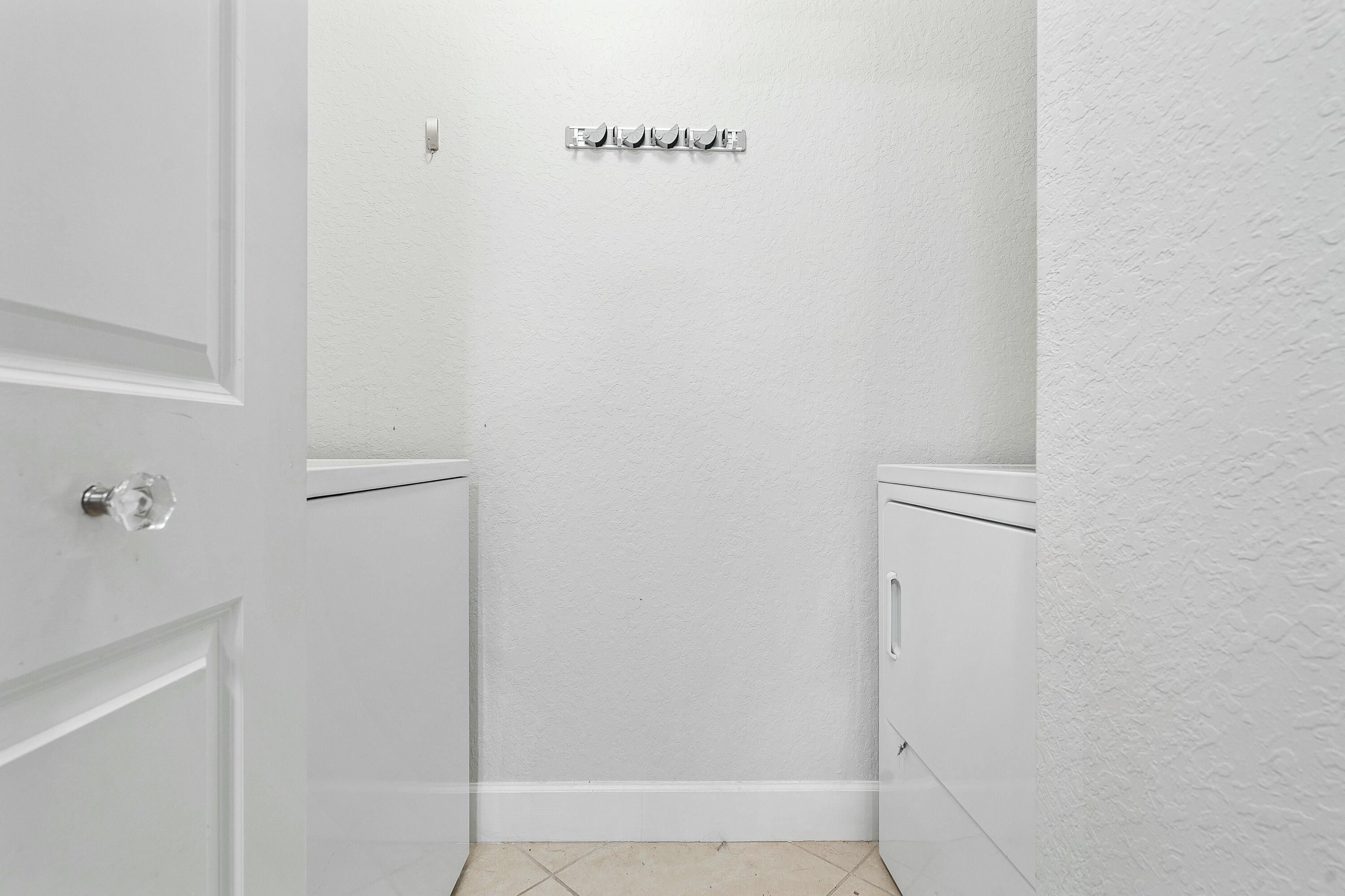 4 Renaissance Way, Unit 414 Boynton Beach, FL 33426 - Photo 16 of 19 Laundry Room