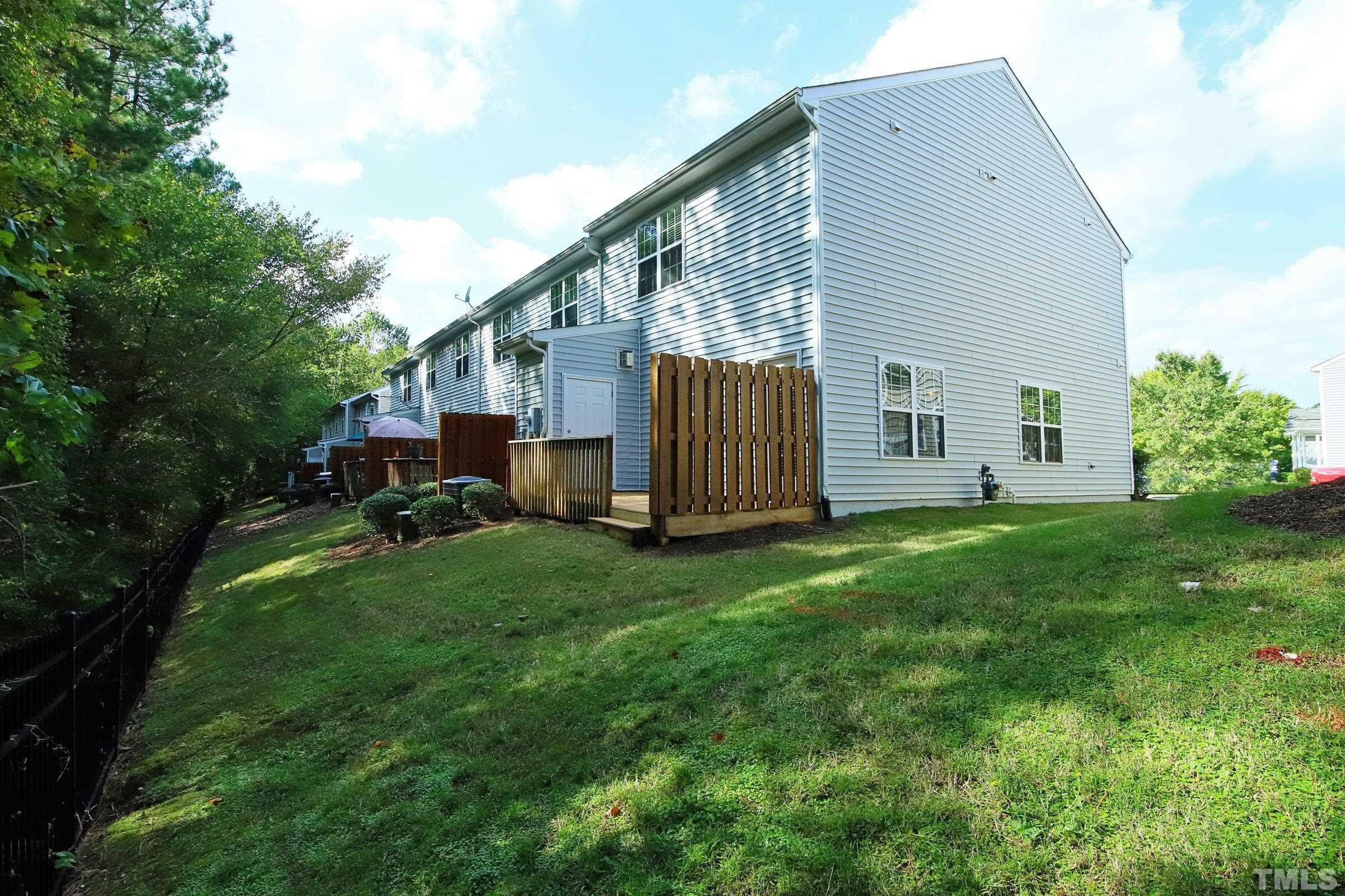 3118 Binghampton Lane Raleigh, NC 27604 - Photo 25 of 27 a view of backyard with garden and deck