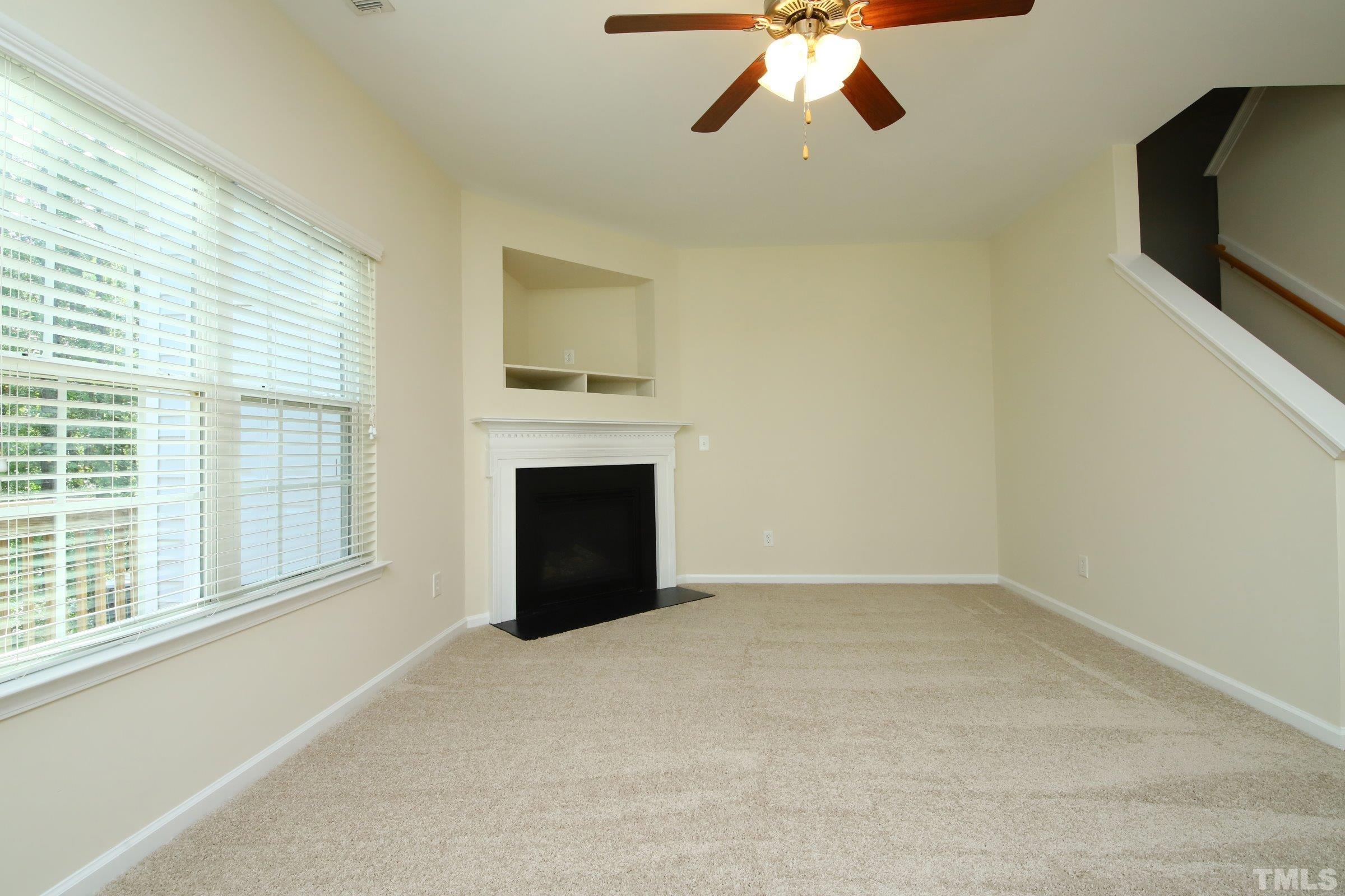 3118 Binghampton Lane Raleigh, NC 27604 - Photo 5 of 27 a view of an empty room with a window