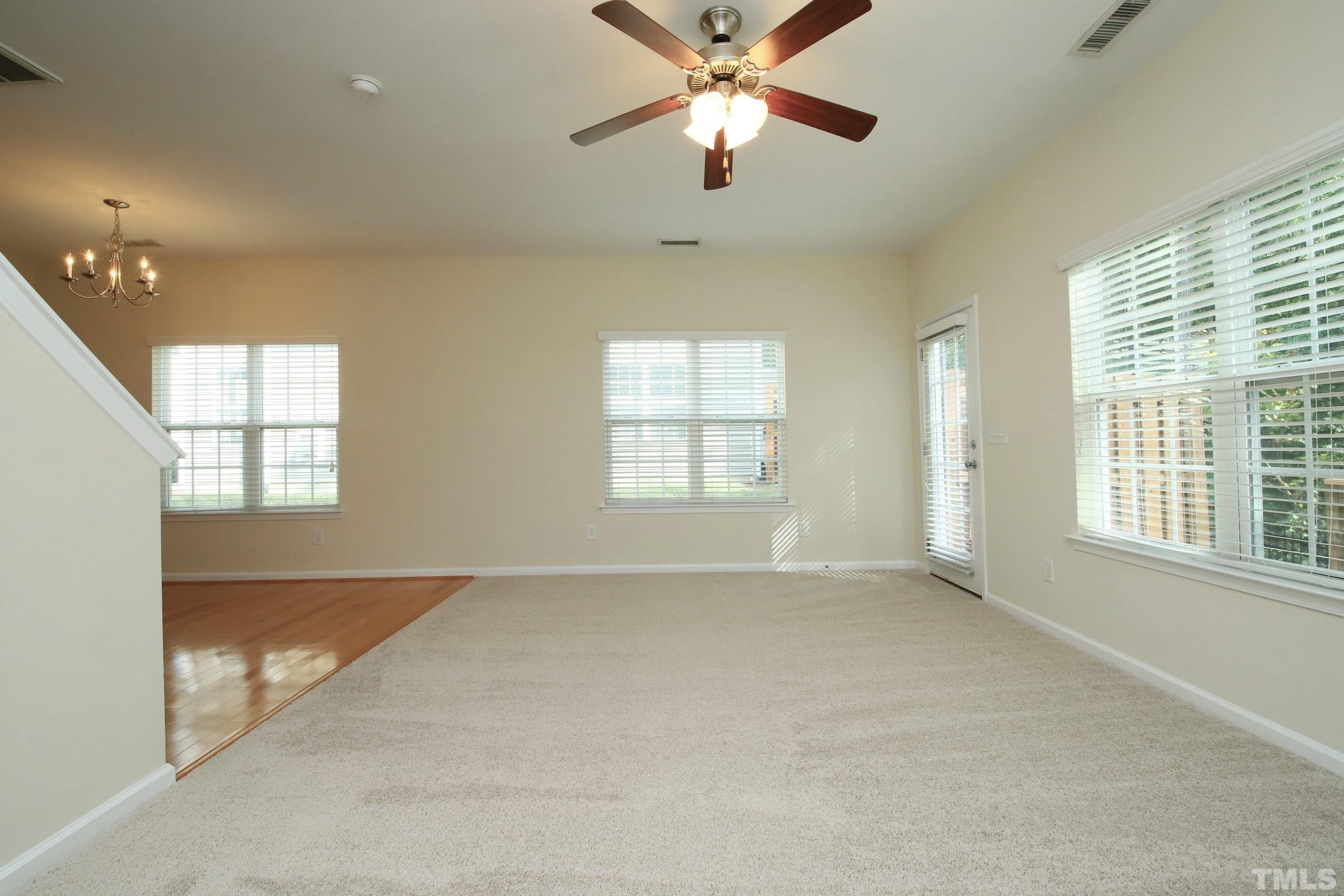 3118 Binghampton Lane Raleigh, NC 27604 - Photo 7 of 27 a view of an empty room with a window