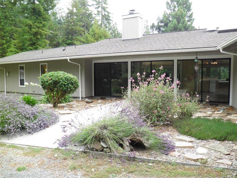 3850 Albion Ridge G Road North Albion, CA 95410 - Photo 1 of 1 a front view of a house with garden