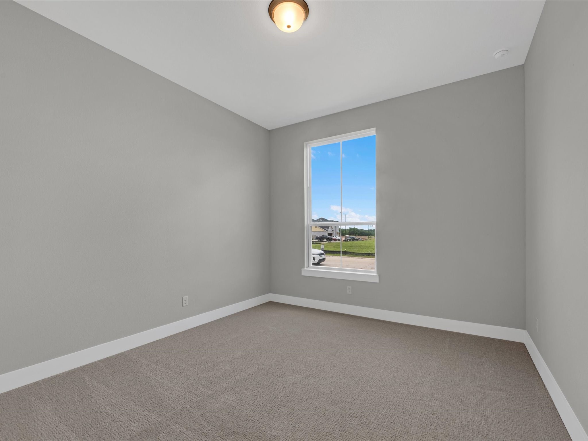 8123 Sunny Rdg Drive Fulshear, TX 77441 - Photo 15 of 42 an empty room with windows and with a window
