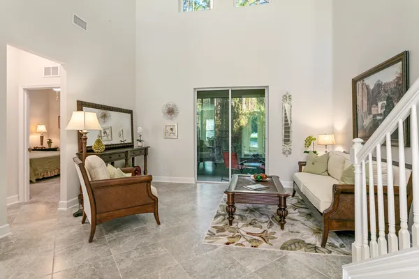 a living room with furniture and a window